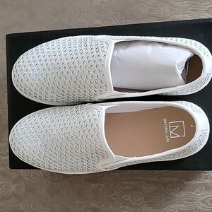 Material Girl white slip ons.